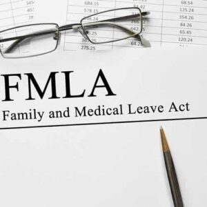 Family and Medical Act with pen and glasses
